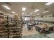 Spacious art room with tables, supplies, and active residents at 2620 Locksley St # 261, Sun City Center, FL 33573