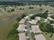 Aerial view of house and surrounding neighborhood at 2620 Locksley St # 261, Sun City Center, FL 33573