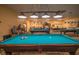 Relaxing billiards room with multiple pool tables and seating at 2620 Locksley St # 261, Sun City Center, FL 33573