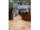 Lobby with marble floors, a curved staircase, and reception desk at 2620 Locksley St # 261, Sun City Center, FL 33573