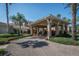 Elegant community center entrance with covered dropoff at 2620 Locksley St # 261, Sun City Center, FL 33573