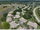 Aerial view of house and surrounding neighborhood at 2620 Locksley St # 261, Sun City Center, FL 33573