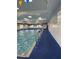 Community pool area with multiple access points and surrounding seating at 2620 Locksley St # 261, Sun City Center, FL 33573