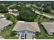 Aerial view of house and surrounding neighborhood at 2620 Locksley St # 261, Sun City Center, FL 33573