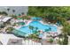 Aerial view of a large, freeform community pool at 2620 Locksley St # 261, Sun City Center, FL 33573