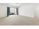 Living room with sliding doors to patio at 776 100Th N Ave # 104, St Petersburg, FL 33702