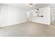 Living room with carpet and kitchen view at 776 100Th N Ave # 104, St Petersburg, FL 33702
