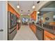 Modern kitchen with stainless steel appliances and granite countertops at 804 Regal Manor Way, Sun City Center, FL 33573