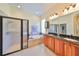 Elegant bathroom with a soaking tub and double sinks at 804 Regal Manor Way, Sun City Center, FL 33573