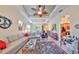 Spacious living room with comfortable seating and access to dining area at 804 Regal Manor Way, Sun City Center, FL 33573