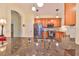 Modern kitchen features granite countertops and stainless steel appliances at 804 Regal Manor Way, Sun City Center, FL 33573
