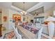 Bright dining area with a view into the living room and kitchen at 804 Regal Manor Way, Sun City Center, FL 33573