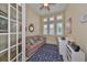 Home office featuring a sofa, work desk, and window seat at 804 Regal Manor Way, Sun City Center, FL 33573