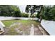 Large backyard with a white vinyl fence at 3819 Queensboro S Ave, St Petersburg, FL 33711