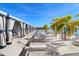 Private pool cabanas with comfortable lounge chairs at 8065 Rolling Shell Trl, Wesley Chapel, FL 33545