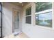 Bright screened porch with view of water at 8065 Rolling Shell Trl, Wesley Chapel, FL 33545