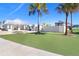 Community pool entrance with restroom facilities nearby at 8065 Rolling Shell Trl, Wesley Chapel, FL 33545