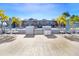 Row of private pool cabanas with shade curtains at 8065 Rolling Shell Trl, Wesley Chapel, FL 33545