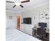 Main bedroom with king bed, dresser, and workspace at 8065 Rolling Shell Trl, Wesley Chapel, FL 33545