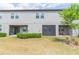 Townhouse with screened patio and small lawn at 8065 Rolling Shell Trl, Wesley Chapel, FL 33545