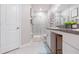 Bathroom with double vanity and walk-in shower at 8065 Rolling Shell Trl, Wesley Chapel, FL 33545