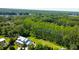 Aerial view of house and private lakefront property at 7510 N Mobley Rd, Odessa, FL 33556