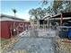 Large backyard with a shed and gravel area at 6902 Rhode Island Dr, Tampa, FL 33619