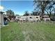 Large backyard with grassy area at 6902 Rhode Island Dr, Tampa, FL 33619