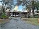 Ranch-style home with a long driveway at 6902 Rhode Island Dr, Tampa, FL 33619