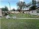 Backyard with two chairs and grassy area at 6902 Rhode Island Dr, Tampa, FL 33619