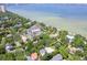 Aerial view of a home on a large lot near the water at 2902 W Bayshore Ct, Tampa, FL 33611