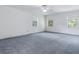 Bright bedroom with ceiling fan and plush carpeting at 2902 W Bayshore Ct, Tampa, FL 33611