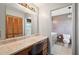 Vanity area and a view of a toilet and bathtub at 31226 Saint Joe Rd, Dade City, FL 33525