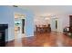 Bright dining area with hardwood floors and a view into the kitchen at 31226 Saint Joe Rd, Dade City, FL 33525