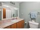 Bathroom with vanity, toilet and shower at 31226 Saint Joe Rd, Dade City, FL 33525