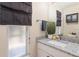 Updated bathroom features granite countertop and a modern vanity at 1553 Scotch Pine Dr, Brandon, FL 33511