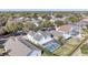 Aerial view showcasing home's private pool and neighborhood setting at 1553 Scotch Pine Dr, Brandon, FL 33511