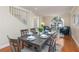 Dining area with hardwood floors and seating for six at 1553 Scotch Pine Dr, Brandon, FL 33511