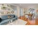 Open living and dining area with hardwood floors and stylish furniture at 1553 Scotch Pine Dr, Brandon, FL 33511