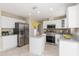 Modern kitchen with stainless steel appliances and granite countertops at 1553 Scotch Pine Dr, Brandon, FL 33511