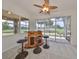 Wet bar with three stools, and view of the golf course at 404 Grand Chateaux Way, Sun City Center, FL 33573