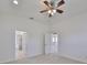 Bright bedroom with access to a private bathroom at 404 Grand Chateaux Way, Sun City Center, FL 33573