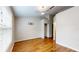 Spacious bedroom with wood flooring and large window at 11310 Stratton Park Dr # 1, Temple Terrace, FL 33617