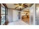 Spacious screened porch with tile flooring and ceiling fan at 11310 Stratton Park Dr # 1, Temple Terrace, FL 33617