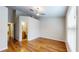 Bright bedroom featuring wood floors and en-suite bathroom at 11310 Stratton Park Dr # 1, Temple Terrace, FL 33617