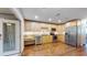 Updated kitchen, featuring stainless steel appliances and wood cabinets at 11310 Stratton Park Dr # 1, Temple Terrace, FL 33617
