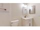 Updated bathroom with white vanity and tiled shower at 11310 Stratton Park Dr # 1, Temple Terrace, FL 33617