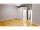 Bedroom with hardwood floors and en-suite bathroom at 11310 Stratton Park Dr # 1, Temple Terrace, FL 33617