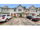 Townhouse community with parking and landscaping at 11310 Stratton Park Dr # 1, Temple Terrace, FL 33617