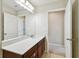 Bathroom with single vanity and access to another room at 10460 Hawks Landing Dr, Land O Lakes, FL 34638